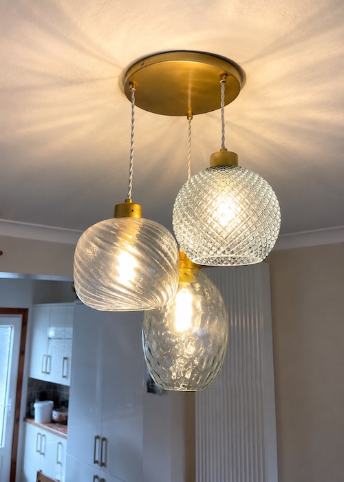 Modern three-pendant ceiling light professionally installed by Dreamy Electrics in a contemporary home in Helensburgh